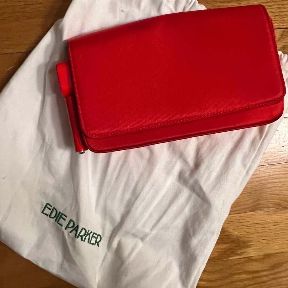 edieparker red clutch with attached lighter
